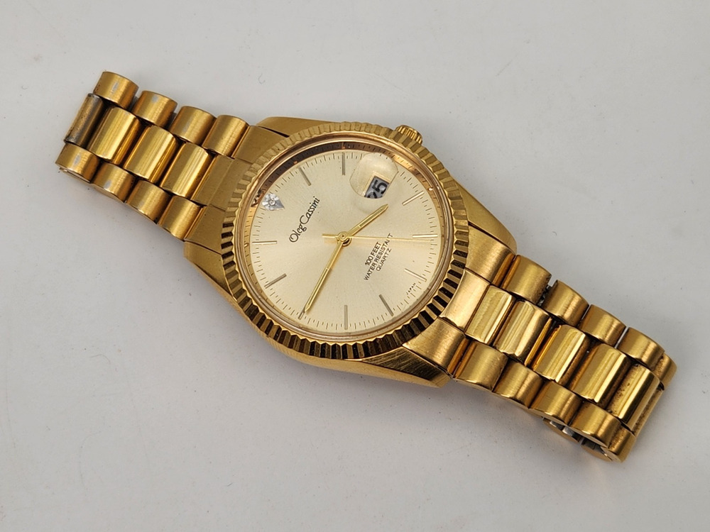 Oleg Cassini 31-727DG Diamond Gold Tone 100 FT WR Quartz Watch